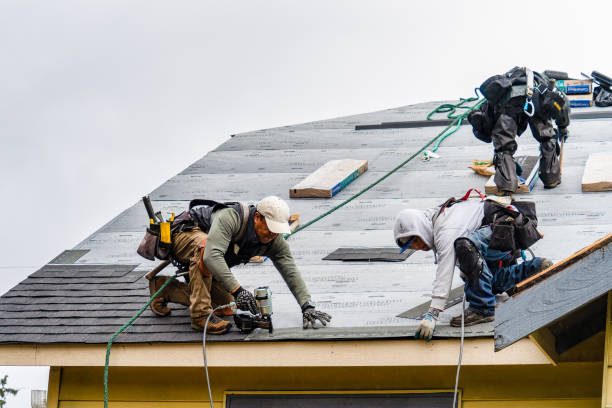 Professional Gutter Installation technician working in Hastings, NY